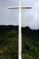 Cross with names carved in it.